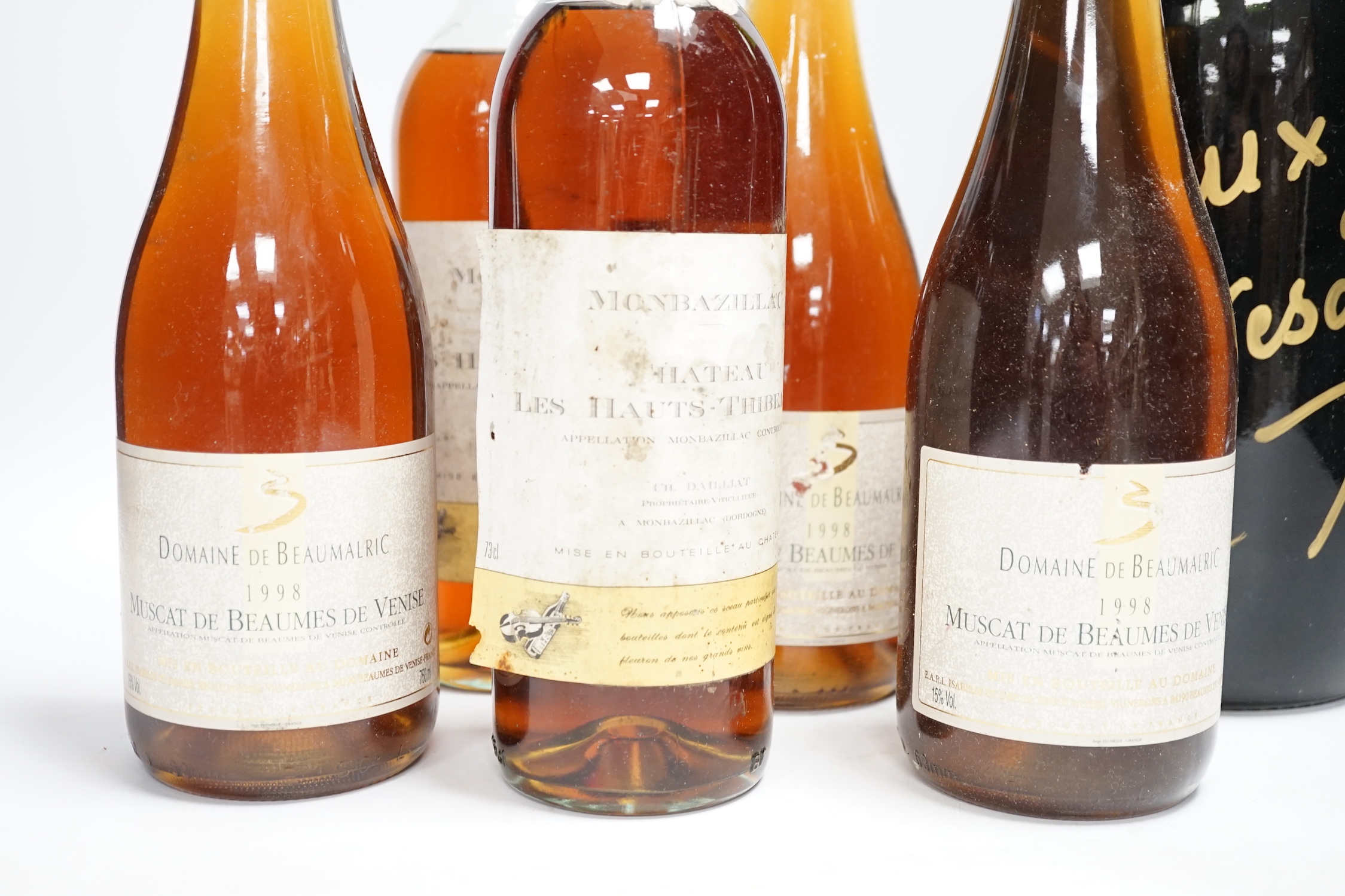 Five bottles of dessert wine including Domaine De Beaumalric 1998 and a magnum